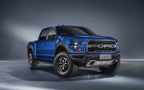 Blue car pickup Ford F-150 on a gray background