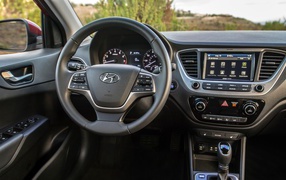 The steering wheel and dashboard of the car Hyundai Accent, 2018