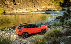 Red Jeep Compass Trailhawk, 2017 on the shore