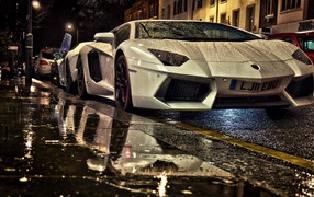 Sports car Lamborghini Aventador in the rain