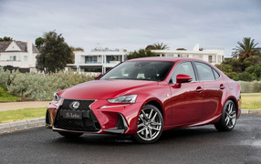Red car Lexus IS 200t F SPORT on the road