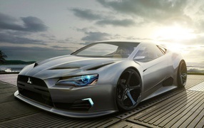 Серебристый автомобиль Mitsubishi в лучах солнца 