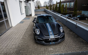 Черный автомобиль Porsche TechArt 911 Turbo GT Street R, 2017