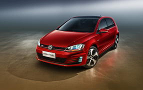 Автомобиль Volkswagen Golf GTI красного цвета 