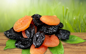 Dried fruits of prunes and dried apricots close-up