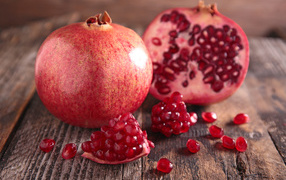 Pomegranate and pomegranate grains close-up