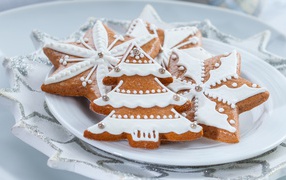 Beautiful New Year's cookies on a white plate