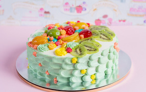 Appetizing beautiful cake with fruits and sweets