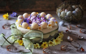 Аппетитный торт с большим бантом и цветами