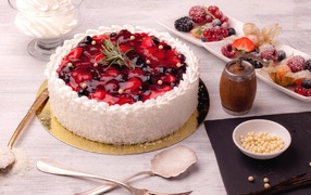 Appetizing cake with coconut shavings and berries