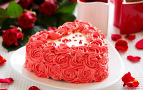 Heart cake with cream red roses