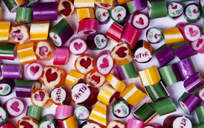 Multicolored candy with inscriptions