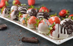 Strawberries in white and black chocolate