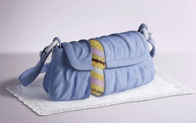 Unusual cake in the form of a woman's handbag