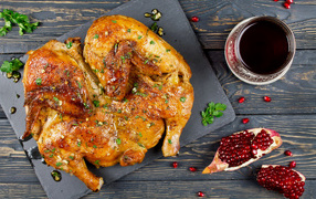 Delicious fried tobacco chicken with pomegranate seeds
