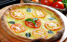 Pizza with cheese and tomatoes with mouth-watering fried edges
