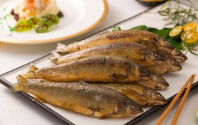 Appetizing fried fish on a plate