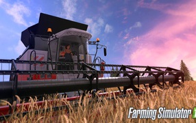 Зерноуборочный комбайн убирает пшеницу игра Farming Simulator 2017 
