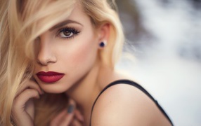 Beautiful blonde with brown eyes and red lips