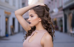 Young girl with brown hair with beautiful make-up