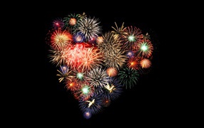 Firework in the form of heart on a black background