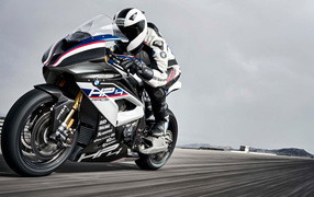 Motorcyclist on a fast motorcycle BMW HP4 Race