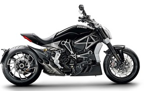 Black Ducati XDiavel S motorcycle on a white background