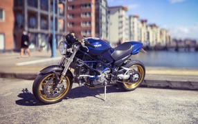 Blue motorcycle Ducati in the city