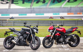 Black and red motorcycles Triumph