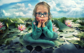A little girl in a green suit is sitting on a leaf of a water lily
