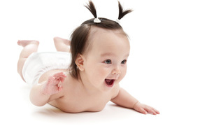 Девочка младенец с хвостиками на голове
