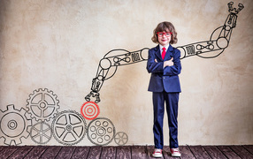 Маленький мальчик будущий ученый в костюме и очках