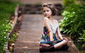 Little girl in a beautiful sarafan