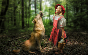 Little girl in a red cap costume with a wolf in the forest