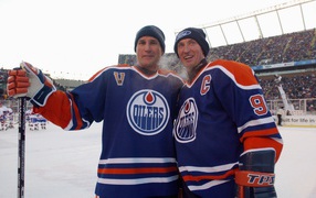 Hockey players, Paul Coffey, Wayne Gretzky posing for photo