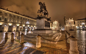 Monument to the Duke of Savoy Emmanuel Filibert in the light of the night lights in the Plaza San Carlo, Turin. Italy