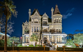 Beautiful mansion at night in the city of Galveston, Texas