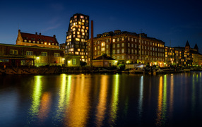 Evening lights of the houses of the city of Copenhagen at the pier, Denmark