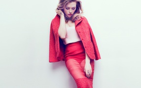 Effective blonde Scarlett Johansson in a red suit