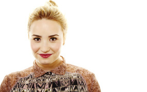 Famous actress, singer Demi Lovato photo on white background