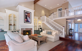 Дом с гостиной в нежных пастельных тонах  