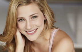 Smiling green-eyed actress Lily Reinhart