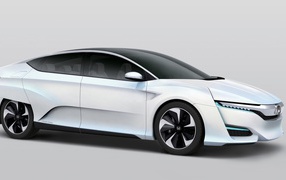 White electric vehicle Honda FCv on a gray background