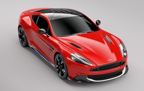 Красный спортивный автомобиль Aston Martin Vanquish S, 2017 на сером фоне