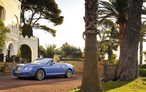 Bentley Continental convertible car in an expensive mansion