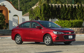 Красный автомобиль Chevrolet Cavalier Premier