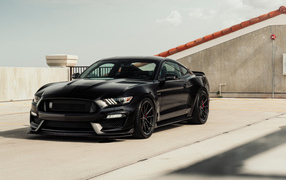 Black fast car Ford Mustang