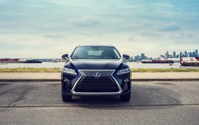 Черный автомобиль Lexus RX 450hL, 2018 года