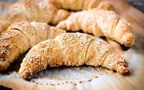 Aromatic fresh croissants with sesame seeds