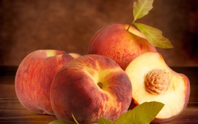 Appetizing juicy ripe peaches close-up